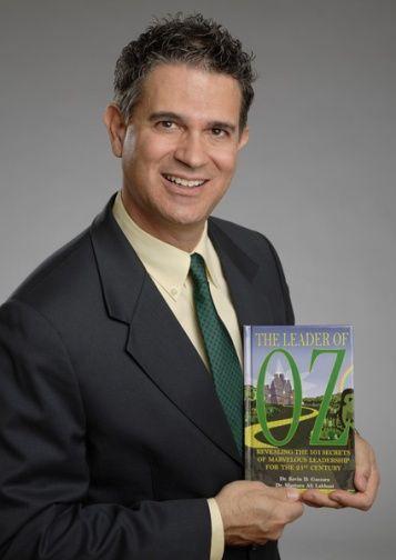 Dr. Kevin Gazarra with Leader of Oz Book